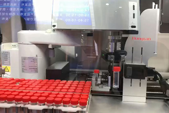 Otomatik numune kabı işleme